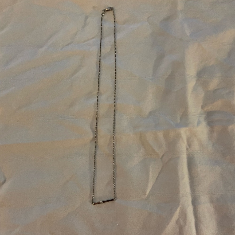 Sterling Silver bar necklace with diamond chip, 17”.